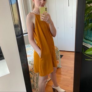 Lush golden high-neck mini dress